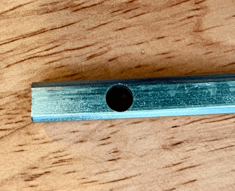 Finished, perfectly aligned hole drilled through a shaft